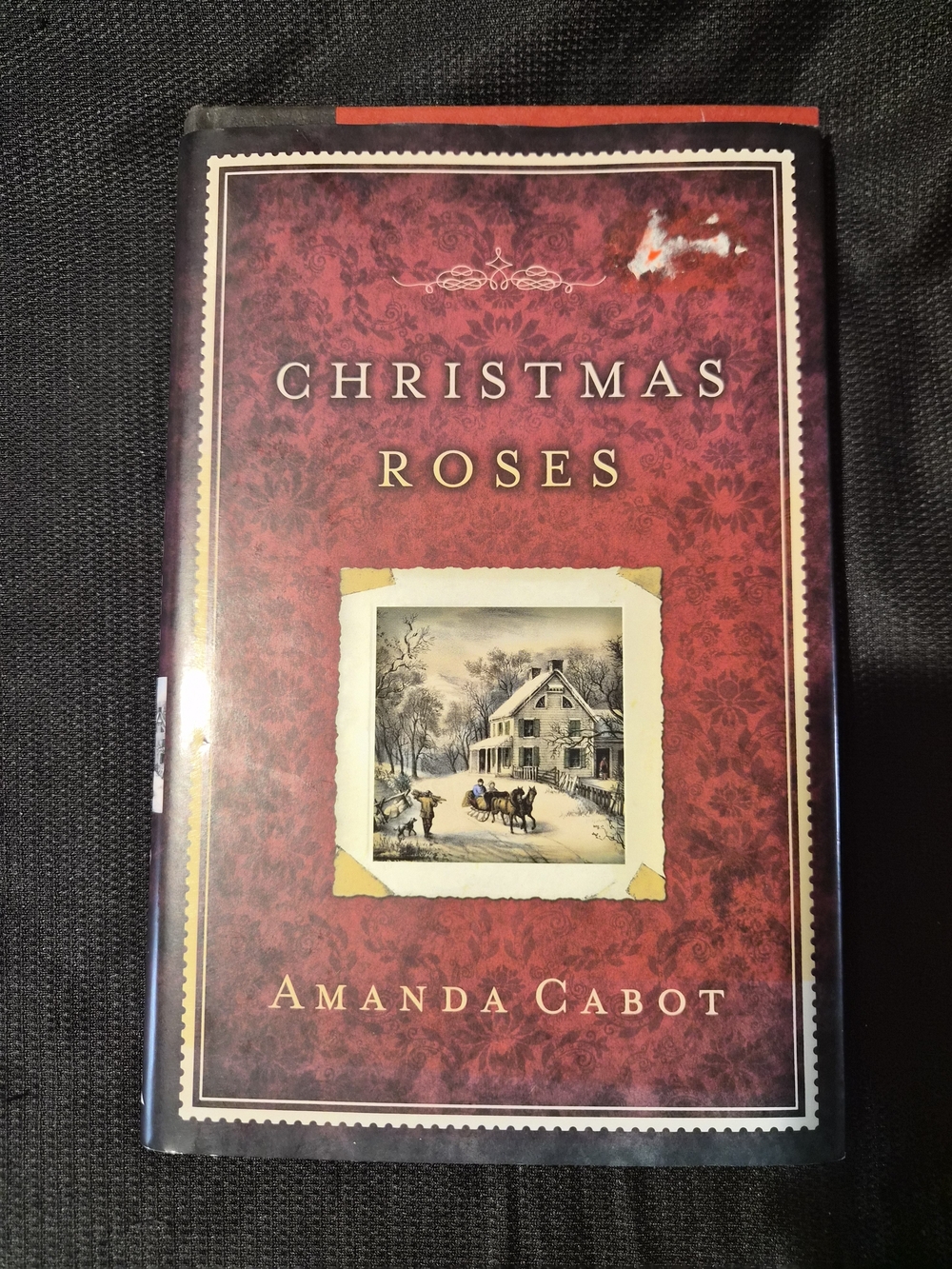 Christmas Roses by Amanda Cabot - Red Hardcover Book